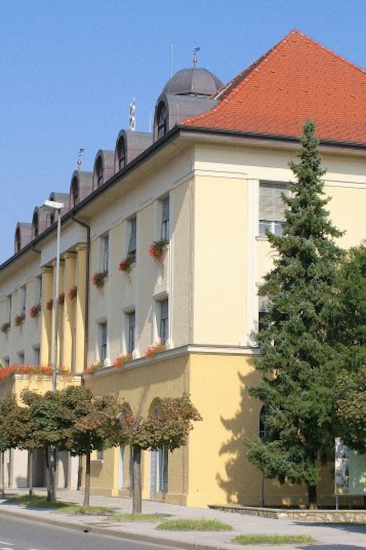 Municipal building facing the church